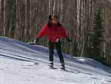 Trying to snowboard
